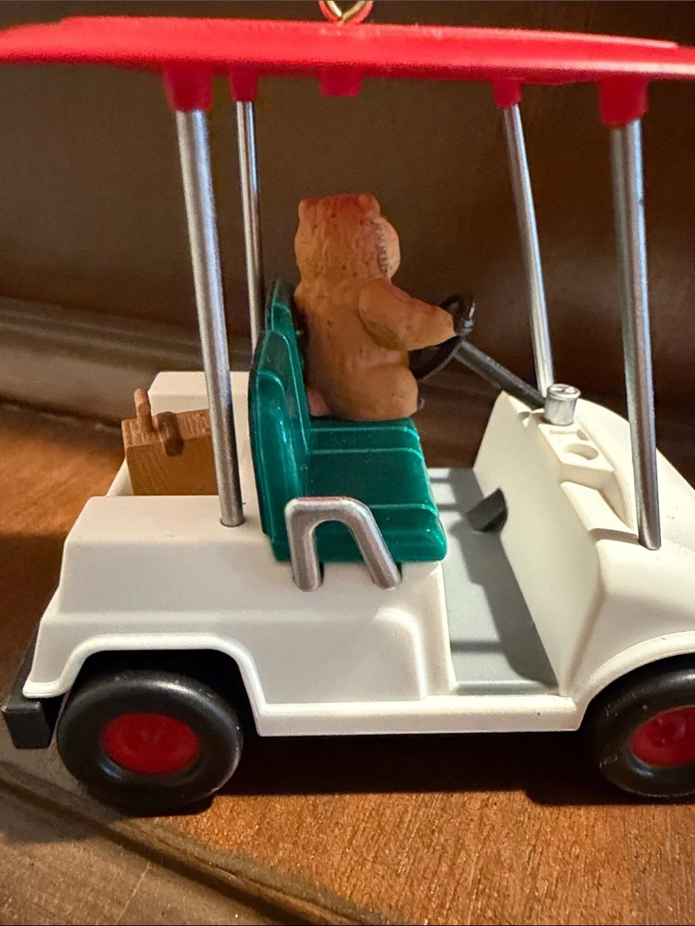 White and Red Golf Cart tree ornament with Green Seat and Plush Driver